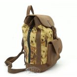 Kutya mintás szövet-bőr hátitáska